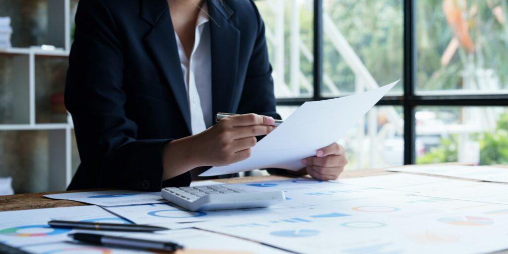 Business woman or accountant making working audit. finance and accounting concept